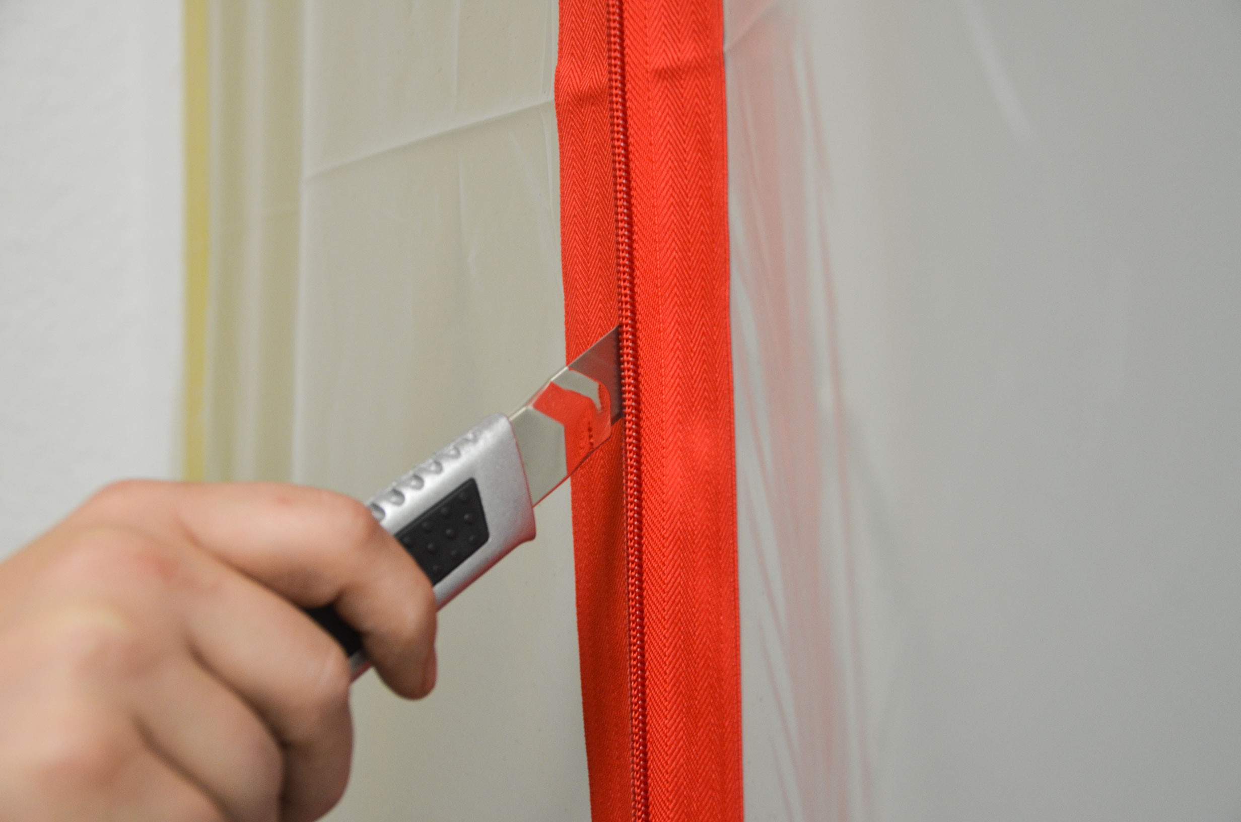 Zero Dust selbstklebender roter Reißverschluss für Staubschu
