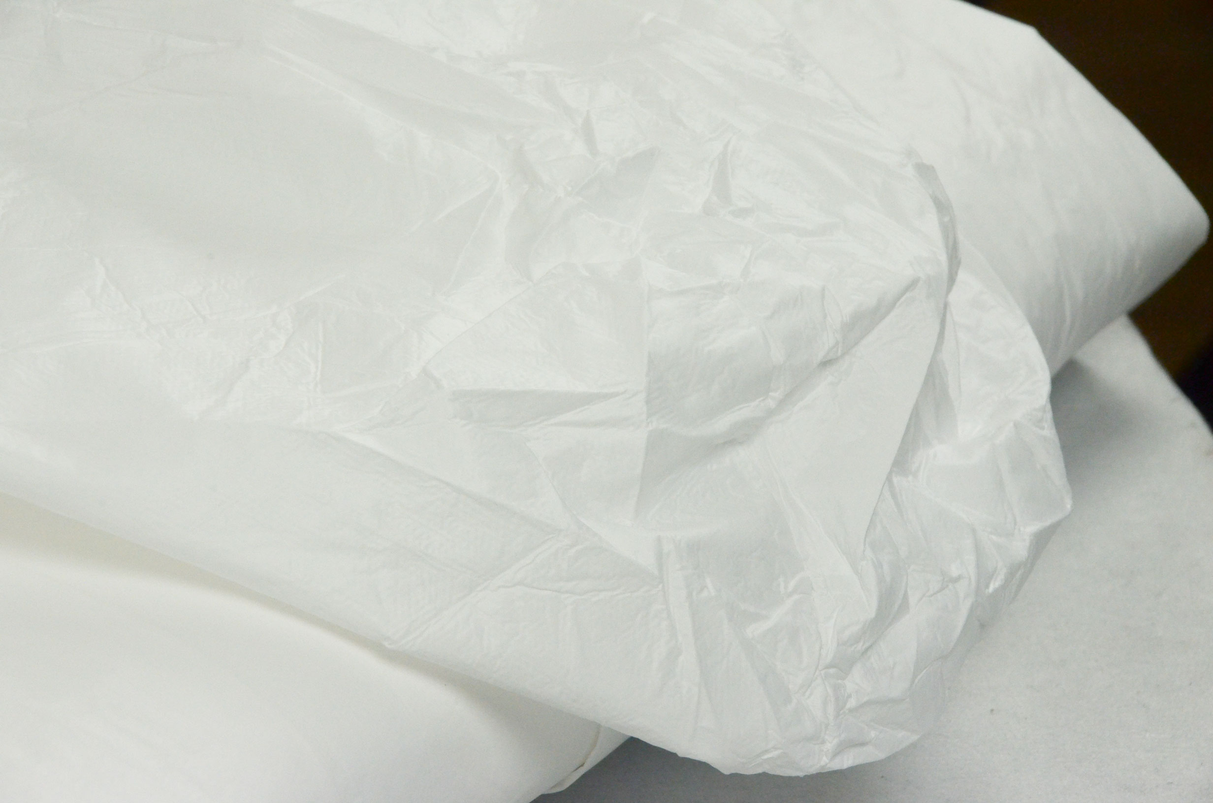 Detail des Materials Chemiekalienschutz-Overall laminiert XL